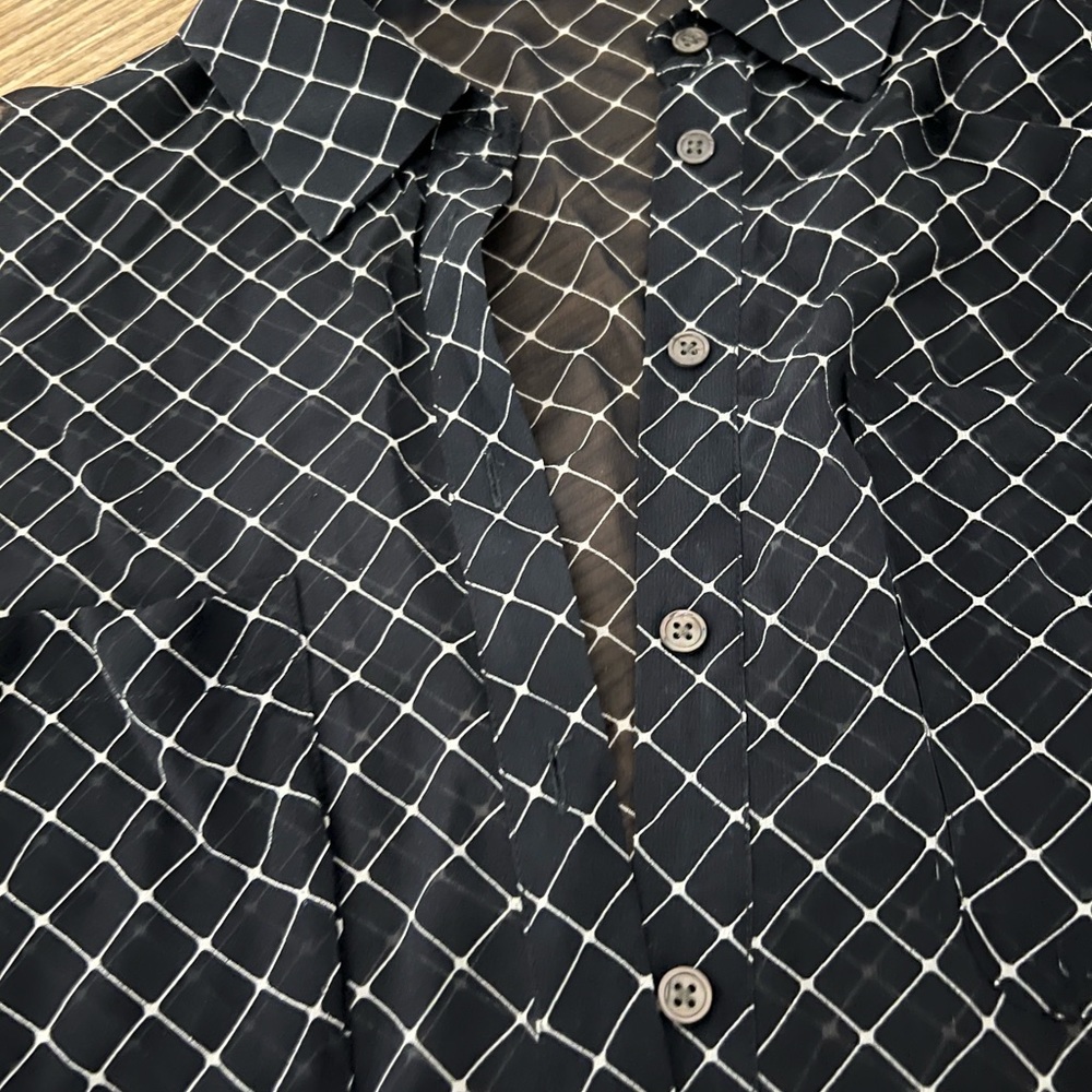 Black sheer long sleeve shirt.